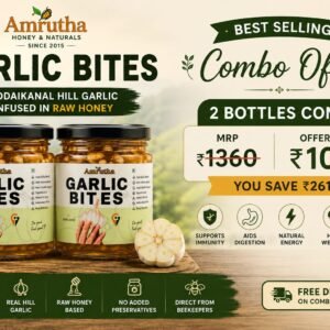 Amrutha Garlic Bites jar of Kodaikanal hill garlic infused in raw honey next to garlic cloves.