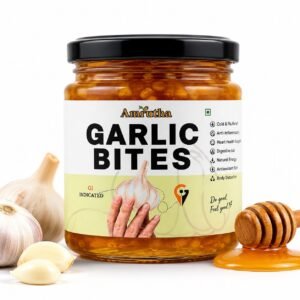 Premium Amrutha Garlic Bites made with Kodaikanal hill garlic infused in raw honey, visible sliced garlic inside glass jar, natural wellness honey product with no added preservatives. 🐝🍯🧄